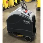 Advance SC1500 Rider Scrubber in warehouse.