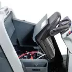 Advance SC6000 scrubber, chair lifted to show battery compartment.