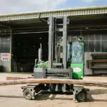Combilift C10,000XL Forklift transporting materials.