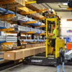 Combilift C6000 ST forklift truck transporting box of specialty metals.