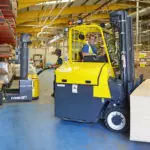 Combilift COMBI-CB8E Electric Forklift trucks in warehouse.