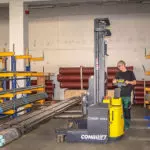 Combilift COMBI-WR4 Reach Stacker in metal shop.