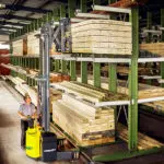 Combilift COMBI-WR4 Reach Stacker in lumber work shop.