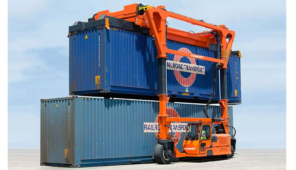 Combilift SC3 Telescopic Toplift straddle carrier container handler moving containers.