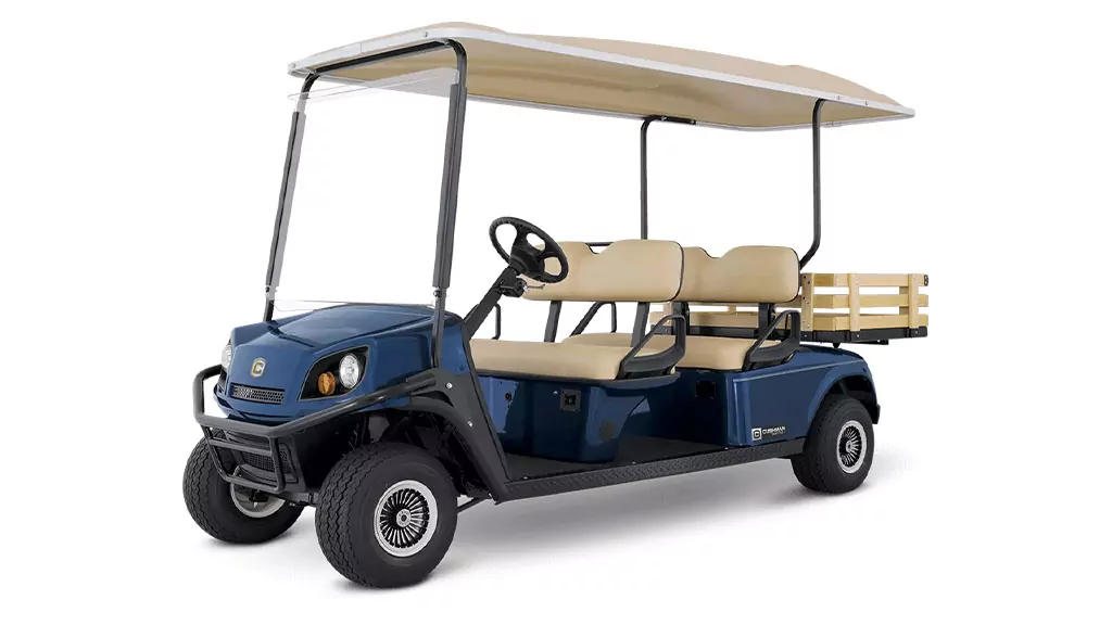 Cushman Shuttle 4 burden carrier vehicle.