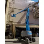 Genie Z-62/40 lifting two operators up the side of a building.