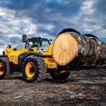 JCB 506-23TC Telescopic Handler carrying large log.