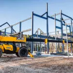 JCB 510-56 Telescopic Handler on building site.