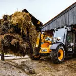 JCB 525-60 Agri Telehandler carrying hay and manure.