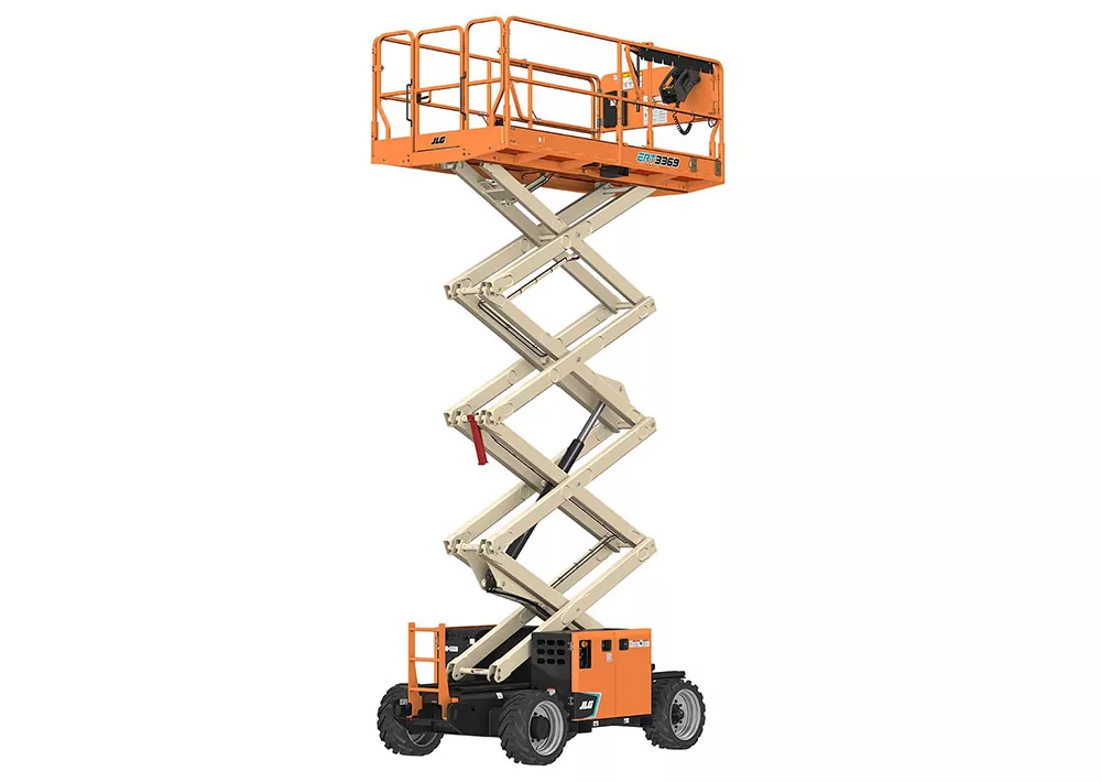 Raised JLG ERT3369 electric rough terrain scissor lift.
