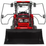 Mahindra 1640 compact utility tractor; cab doors open.