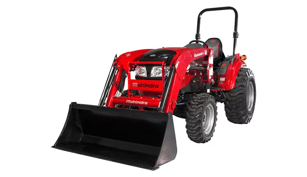 Mahindra 1640 HST compact utility tractor with bucket loader attachment.