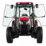Mahindra 2660 compact utility tractor: front view with cab doors open.