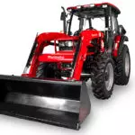Mahindra 6075 utility tractor with cab and bucket attachment.