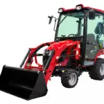 Mahindra eMax20S HST with cab and bucket attachment.