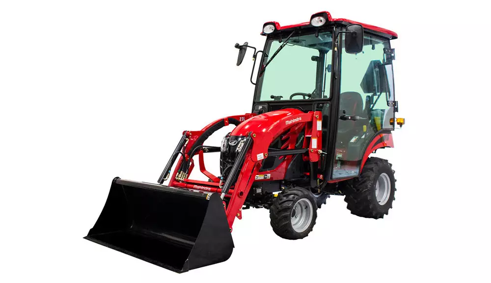 Mahindra eMax20S HST with cab and bucket attachment.