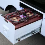 Taylor-Dunn Bigfoot Burden Carrier Utility Vehicle toolbox area.