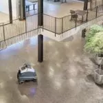 Advance Liberty SC50 autonomous scrubber cleaning business floor.