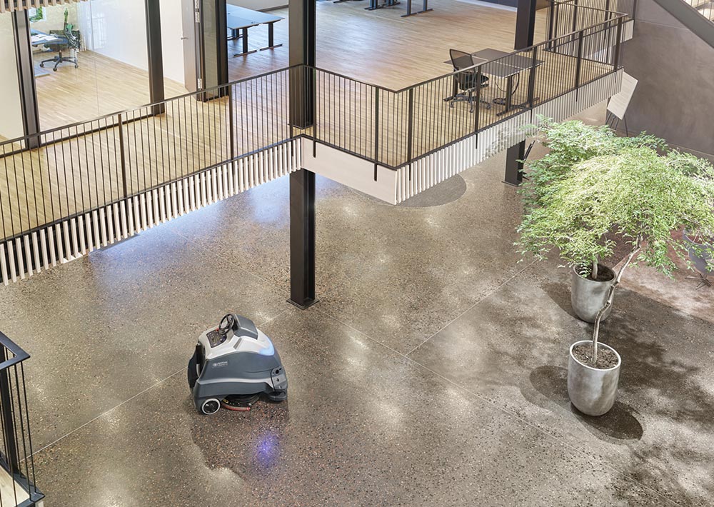 Advance Liberty SC50 autonomous scrubber cleaning business floor.