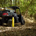 Polaris Commercial PRO XD Full-Size Diesel Utility Vehicle back view on dirt trail.