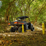 Polaris Commercial Pro XD Full-Size Gas utility vehicle on dirt trail.