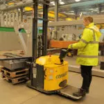 Combilift Combi-CS Counterbalance Stacker Lift Truck in action in warehouse.
