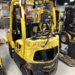 Hyster forklift angled back view.