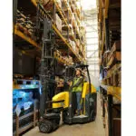 Combilift Aisle Master OP Order Picker with mast up inside warehouse.