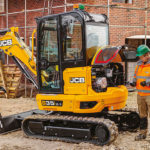 JCB 35z-1 compact excavator on construction site.
