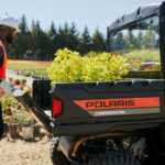 plants being loaded onto Pro XD Mid-Size Gas Utility Vehicle by Polaris Commercial.