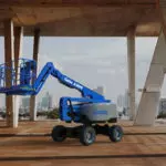 Genie Z-45 FE Boom Lift under a bridge.