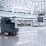 Advance SC5000 rider scrubber in an airport terminal.