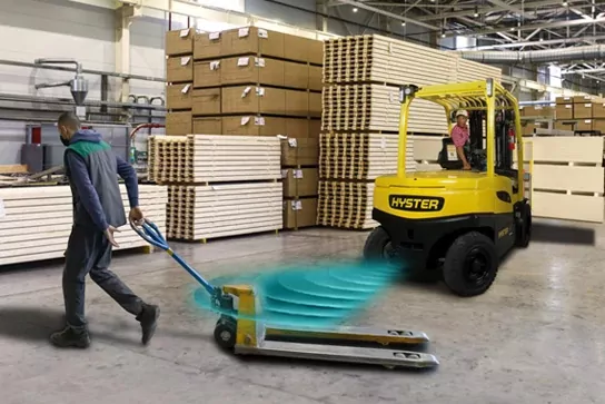 Hyster Reaction showing the forklift operator that another employee moving a pallet jack is in close range behind the forklift.