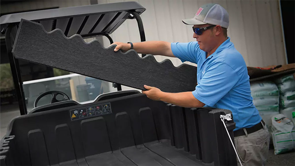 Cushman Hauler utility vehicle cargo bed divider.