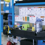 Genie Boom Lift Tool Tray accessory installed on a boom lift.