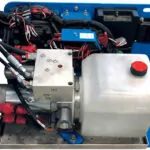 Genie Lift Tools spill guard accessory attached on a scissor lift.