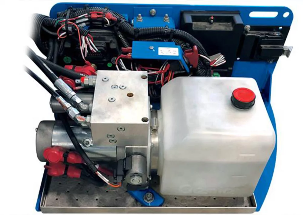 Genie Lift Tools spill guard accessory attached on a scissor lift.