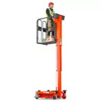 JLG 830P Push Around Vertical Lift with operator.