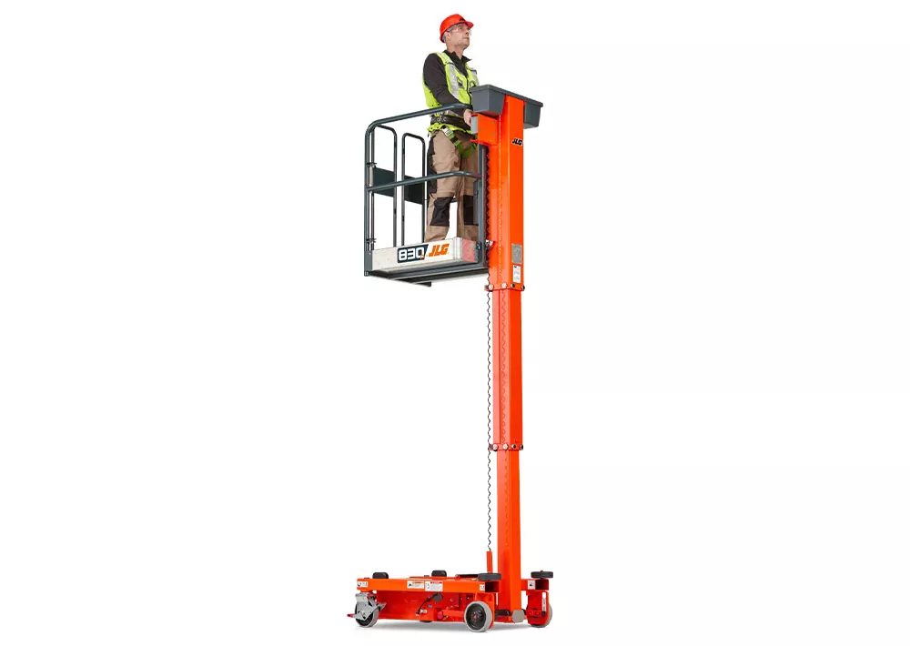 JLG 830P Push Around Vertical Lift with operator.
