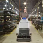 Advance SC800 scrubber with cylinder scrubbing manufacturing shop floors.