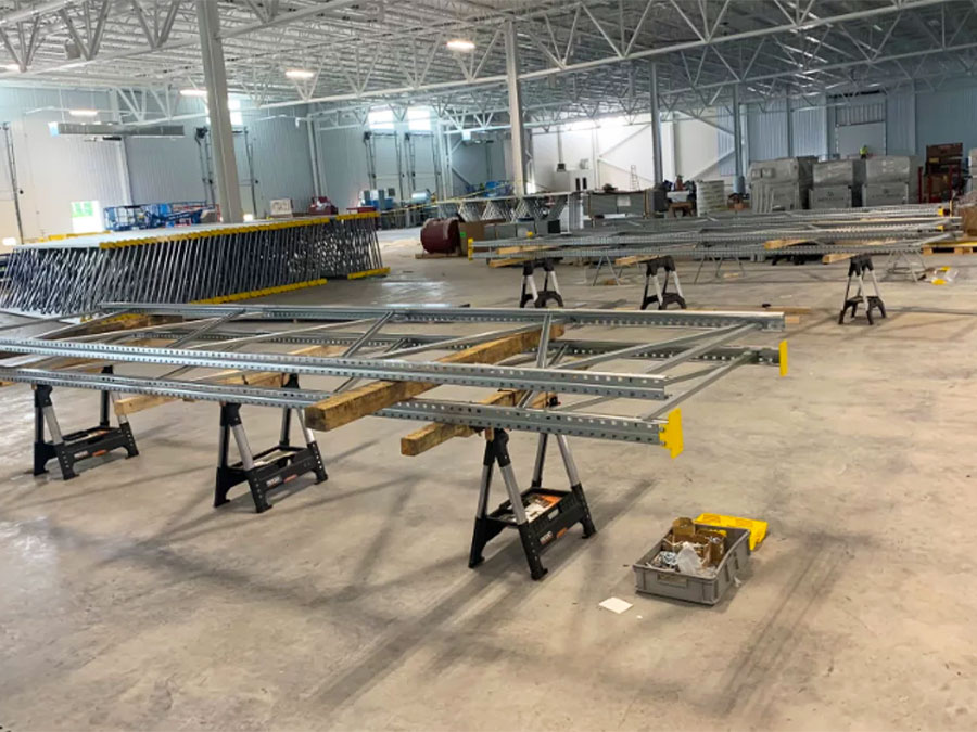 Racks on saw horses during warehouse installation.