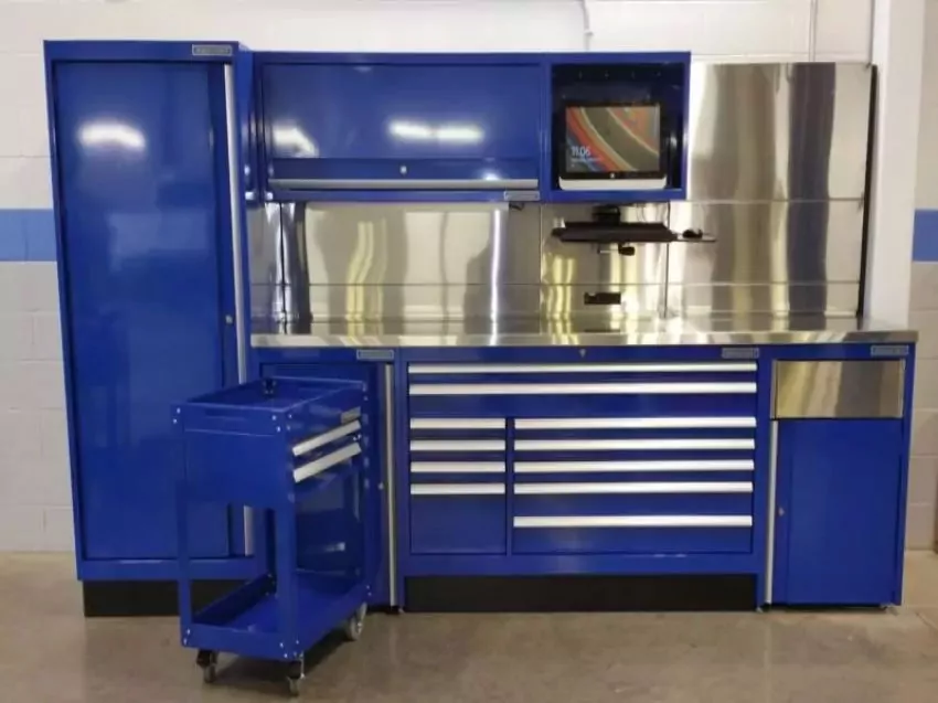 royal blue workbench with work space, cabinet doors and drawers.