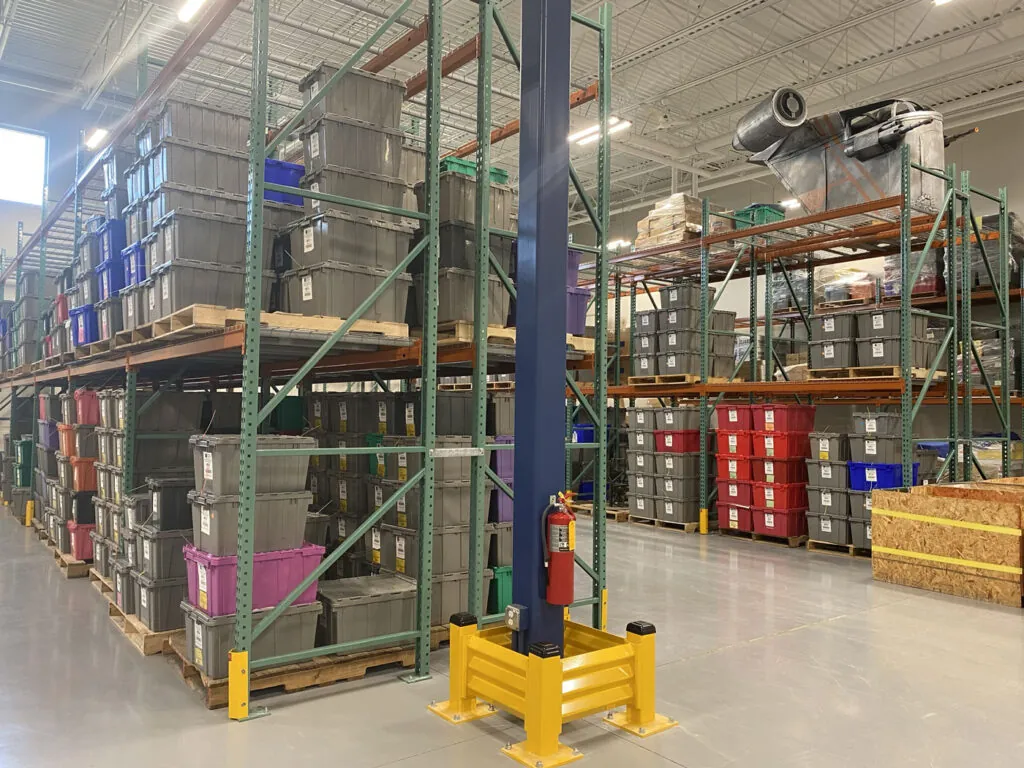 Einstein's selective pallet racking with bins.