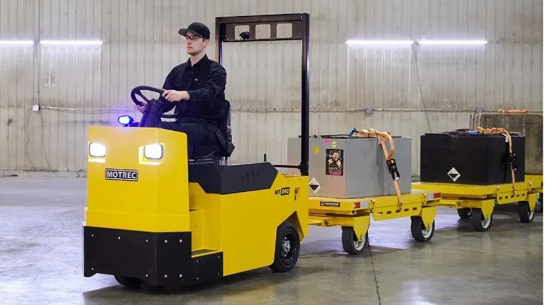 Motrec MT-340 pulling flat deck cart trailers. 