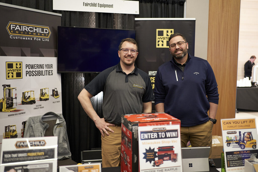 Fairchild Equipment team members TJ Ball and Tory Schmelzer at Fairchild's booth at the Manufacturing Matters! 2024 Conference.