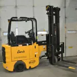 Bendi B3/30AC VNA forklift in a garage.