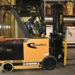 Drexel SL50AC electric very narrow aisle forklift in warehouse.