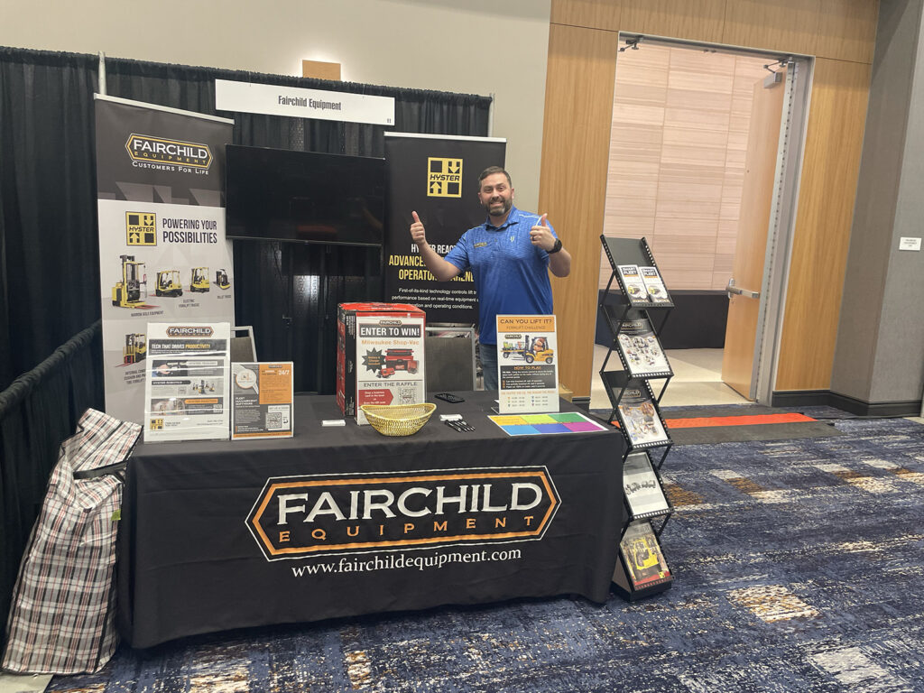 Fairchild Equipment representative Tory Schmelzer at Fairchild's booth at the Manufacturing Matters! 2024 Conference.
