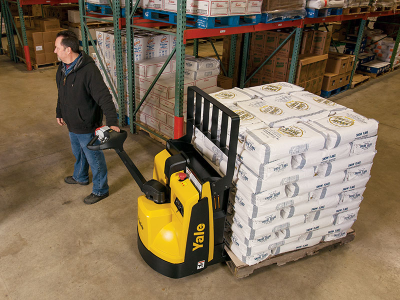 Yale walkie pallet truck in a warehouse.