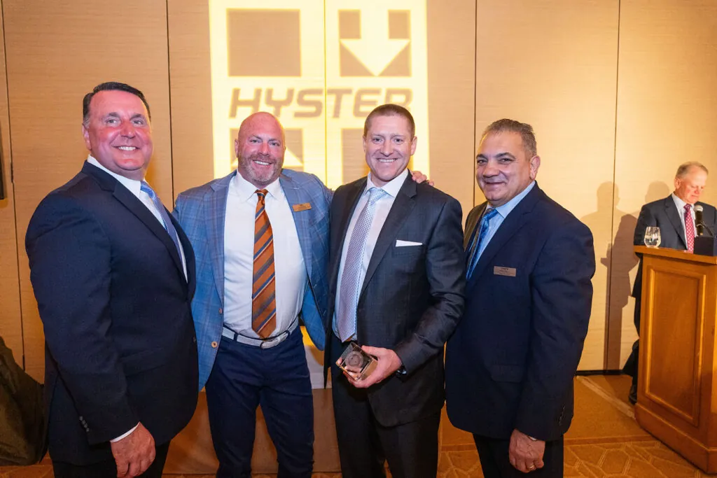 Fairchild Equipment President, Van Clarkson, and CEO, Chad Fairchild, accepting Hyster Dealer of Distinction award.